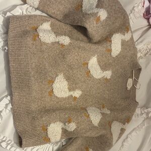 Charming Beige Sweater with Duck Design